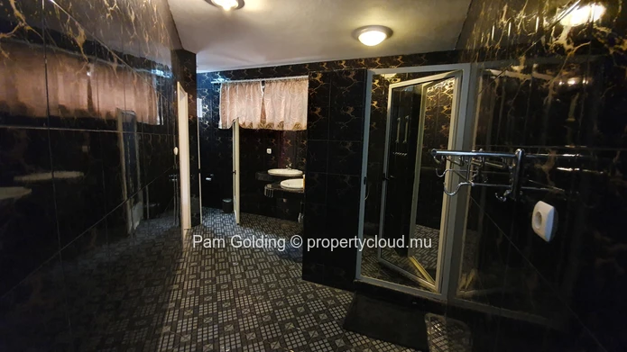Spacious 8-Bedroom Property with Pool for Sale in Flic en Flac