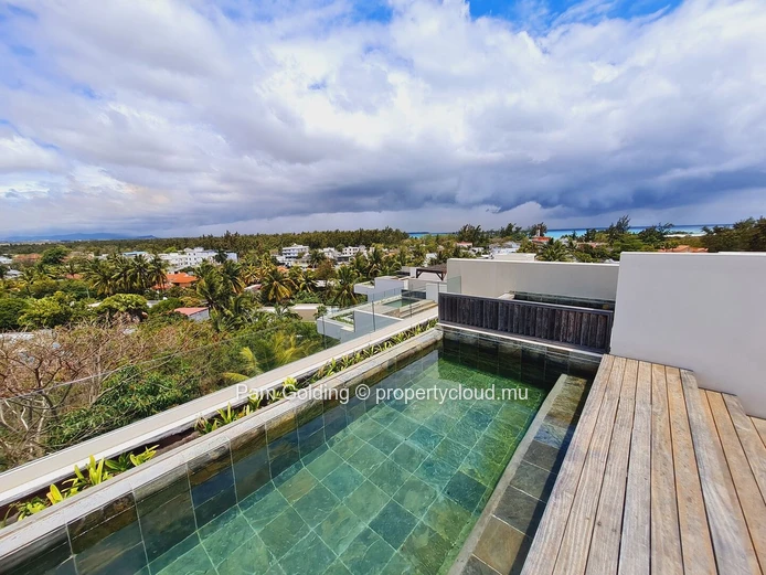 Luxury 2-Bedroom Apartment with Private Rooftop Pool & Stunning Mountain/Sea Views near Mon Choisy Beach (Sole Mandate)